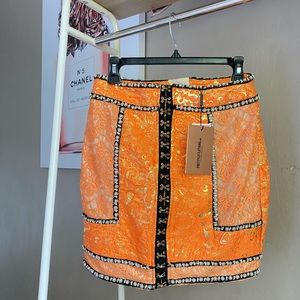 Orange mini skirt